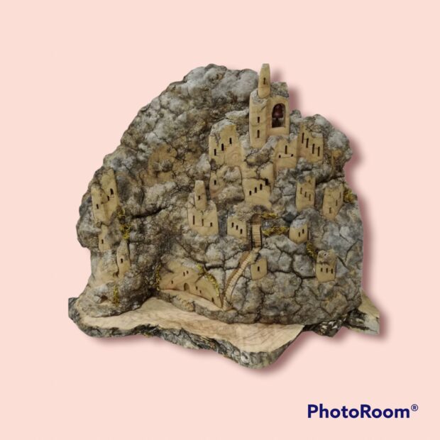 Decorative village made of 900 year old olive wood